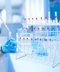 Compact Lab Glassware Drying Rack For Beakers And Flasks lightweight design with colorful beakers being cleaned in lab.