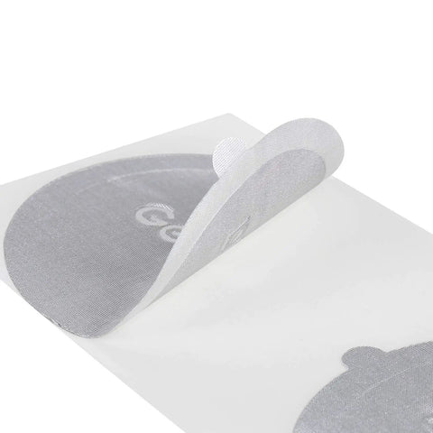 Reusable Aluminum Foil Seals Lids For Nespresso VertuoLine Capsules, 120 Count, showing close-up of silver foil lid.