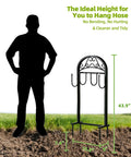 Garden Hose Holder Stand Rustproof Freestanding Heavy Duty With Beefy Metal Frame beside person for scale outdoors