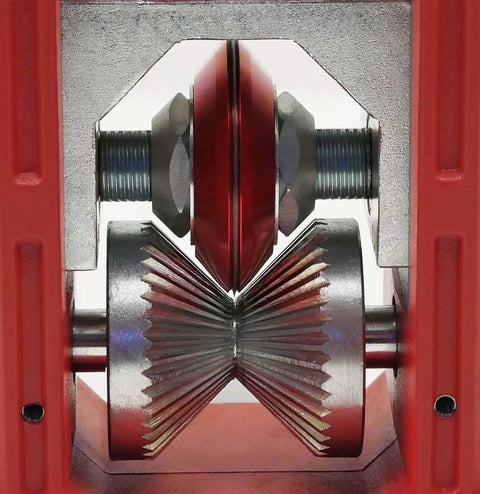 Close-up of wire stripping mechanism on Hand Crank Copper Wire Stripper And Cable Stripping Machine For Wires 18 AWG To 1250 Kcm.