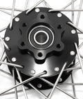 16 Inch Rear Spoke Wheel Hub Rim For Sur Ron Light Bee X Light Bee S Segway X160 X260 79 Bike Falcon M E Ride Pro SS Off Road Dirt Bike Anodized Rim 7116 T7 Alloy Black Hub Built To Tear Up Rough Trails close-up of black anodized hub and stainless steel spokes.