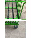 Heavy Duty Material Handling Cart And Industrial Storage Trolley For Sheet Metal No Nonsense Warehouse Rolling Rack view of sturdy green steel frame and swivel casters.