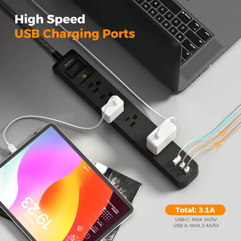 8 In 1 Power Strip Surge Protector With 5 Widely Spaced Outlets, 3 USB Ports, 6 Ft Braided Extension Cord next to laptop and tablet