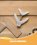 2 Pack Kids Crib Rail Connector Clips For Playpens, Safe Locking Bed Rail Clamps, on wooden surface, tool-less convenience emphasized.