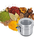 Heavy Duty Airtight Stainless Steel Coffee Canister Keeps Your Daily Grind Fresh And Locked Tight For Kitchen Storage Holds Sugar Tea And Coffee Beans In Medium Sized Jars with spices around.