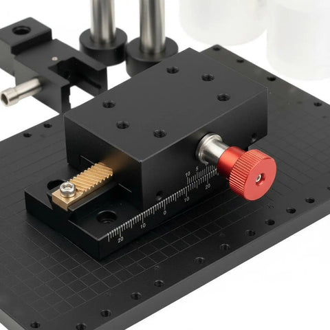 Top Notch Precision Dovetail Linear Stage With Dovetail Guide And Manual Rack And Pinion Travel For Rock Solid Fine Positioning Optical Alignment And Small Fixture Adjustments In Scientific Labs And Research, black metal stage with red knob