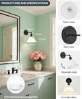 HOJOYRI Black Recharge Battery Operated Wall Sconces Set of Two with Remote installed in a bathroom with adjustable fabric shade.