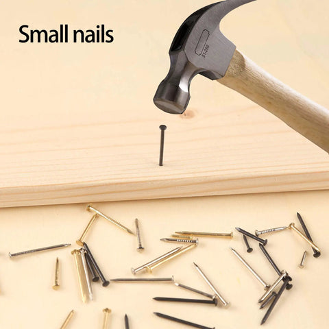 Heavy Duty Mini Nails With Smooth Round Heads, Pro Grade Black Steel Pins Solidly Sized At One Inch, 500 Piece Bundle Ideal For String Art Creations And No Fuss Diy Setup Work being hammered into wood.