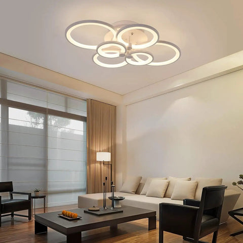 Dimmable Modern Ring Ceiling Light With Six Acrylic Rings Flush Mount LED Chandelier in modern living room setting.