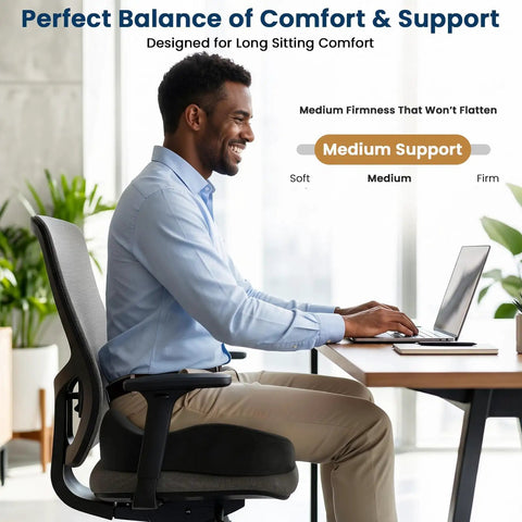 Kick Sciatica To The Curb With This Ergonomic Memory Foam Seat Cushion For Office Chair And Car Seat featuring a man at a desk.