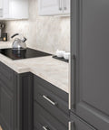 Avellino Collection Slick Brushed Nickel Cabinet Handle 11 3 8 Inch Center To Center Bar Pull installed on dark kitchen cabinets