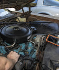 Mechanic using WiFi Pro Borescope With Dual Lens 5.5 mm 9.8 Foot Armored Waterproof Gooseneck Endoscope to inspect car engine