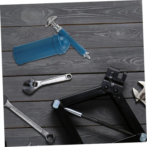 80cc Mini Grease Gun Portable Manual Lubrication Tool with Sky Blue Electroplated Finish and tools on wooden surface