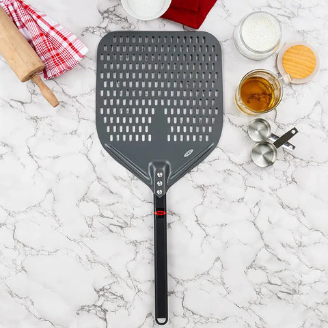 Perforated 12 Inch Pizza Peel, Metal Pizza Turner For All Ovens, Indoor Outdoor Use, Lightweight And Durable Anodized Aluminum With Heat Resistant Handle on marble counter