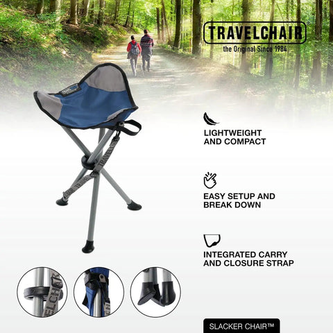 Slacker Tripod Camp Chair With Lightweight Frame and Adjustable Carry Strap, shown in a forest path, highlighting duck feet and compact design.