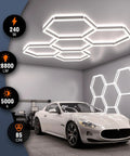Hexagon LED Garage Light 5-HEX 240W 5000K Daylight installed in garage above car, showing bright, modular honeycomb design