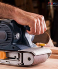 Person using belt sander with 4x36 Sanding Belts For Woodworking Kit, 12 Pcs Belt Sander Paper Set With 2 Each Of 60 80 120 180 240 400 Grits