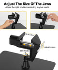 Adjusting the jaws on a Heavy Duty Magnetic Soldering Third Hand with 360 degree hot air gun holder and large steel base.