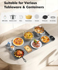Roll Up Food Warmer Mat With 15W Wireless Charger And Quick Heat, displaying various dishes and containers, grey mat in use.