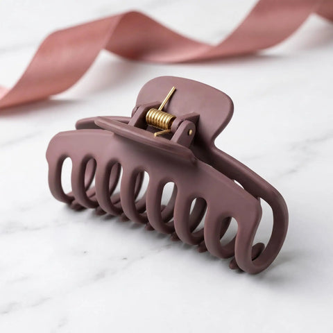 8 Pack Hair Clip Spring Replacement with strong clamping steel jaw clips on marble surface