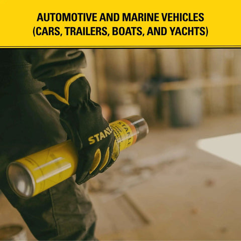 Person holding Pro Grade Closed Cell Spray Foam Insulation Kit for automotive and marine vehicles, with yellow gloves.