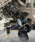 Flo Torq II Hub Kit Replacement OEM Upgrade For Mercruiser Alpha One Bravo One Mercury Mariner Outboard Drives 60 300 HP 15 Spline Propeller Installation Parts Fits Quicksilver And Other Aftermarket Props with black propeller and installation components on display.