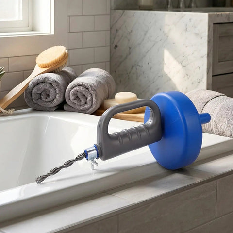 Heavy Duty 33 Foot Manual Drain Snake Featuring Flexible Spring Steel Wire That Busts Gnarly Clogs And Main Line Blockages While Gliding Smoothly Through Every Pipe Bend resting on a bath edge.