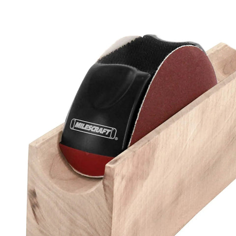 Hand Sanding Tool For Getting Into Nooks And Crannies On Intricate Surfaces With 5 Inch Disc Compatibility on wooden surface