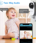 Mini Smart Home Camera 1080P 2.4G WiFi Security Cam With Ultra Wide 120 Degree Lens showing two-way audio feature with child.