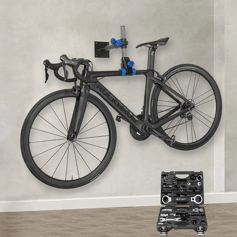 Wall Mounted Bike Repair Stand With Height Adjustable Clamp And Workbench Mount For Road And Mountain Bikes DIY Friendly Home Bicycle Maintenance Rack For Quick Repairs supporting a black bike on a wall.