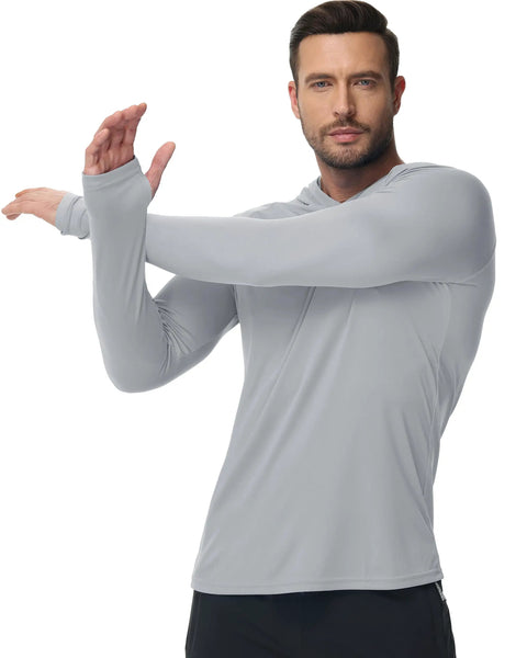 Model wearing Men's Hooded Rash Guard Long Sleeve UPF 50 Plus Sun Protection For Fishing And Beach Wear Quick Dry Breathable 4 Way Stretch Raglan Thumb Hole Shirt Gray XL, showing flexibility of the fabric.