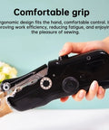 Portable Mini Sewing Machine For Beginners With An Integrated Storage Kit being held with ergonomic grip