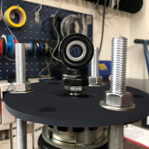 Close-up of Strut Compressors Shock Spring Tool For M8 Softail Models Preload Adjuster with bolts and plate.
