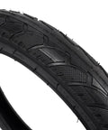 Close-up of all-terrain tread on 16x2.50 Tire And Inner Tube Set For Scooters Ebikes BMX And Kids Bikes 65-305 Size Fits Most 16 Inch Wheels.