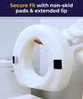 Person holding 4-Inch Portable Toilet Seat Riser For Seniors With No-Tool Install, showing non-skid pads and extended lip.