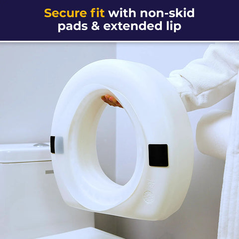 Person holding 4-Inch Portable Toilet Seat Riser For Seniors With No-Tool Install, showing non-skid pads and extended lip.