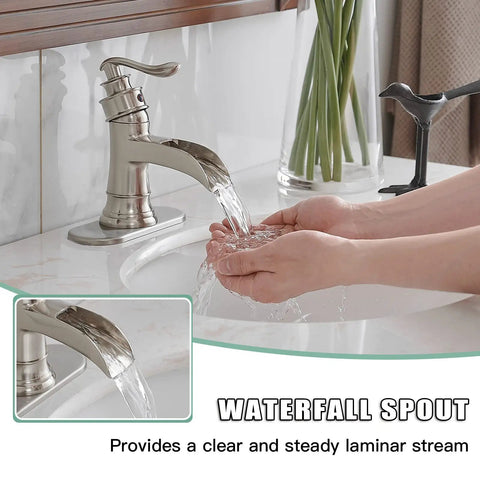 Person washing hands with Brushed Nickel Bathroom Sink Faucet 1 Hole Single Handle Waterfall Style Brass Construction Lead Free Vanity Faucet For Home Or Commercial Use No Pop Up Drain Easy Install And Durable Design