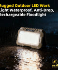Rugged outdoor LED work light, waterproof, anti-drop, USB-C rechargeable floodlight in the rain.