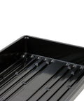 Close-up of a black 10x20 inch propagation tray with no drain holes, part of a set of 10 for seedlings, microgreens, garden, and hydroponics