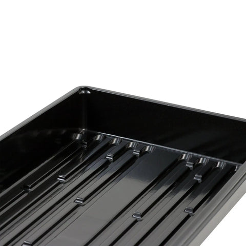Close-up of a black 10x20 inch propagation tray with no drain holes, part of a set of 10 for seedlings, microgreens, garden, and hydroponics