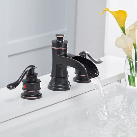Widespread 8 Inch Two Handle Bathroom Faucet With Pop Up Drain Assembly Waterfall Style Oil Rubbed Bronze Finish in use