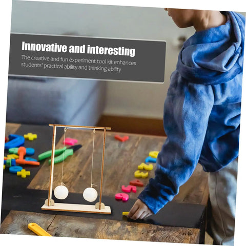 Child engaging with 2 Piece Physics Experiment Kit For Students Hands On Science Learning Tool For Class Demonstrations And Projects Safe Wood Materials Easy Setup Engaging Physics Experiments, featuring wooden pendulum in classroom setting.