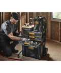 Man using ToughSystem 2.0 3 Drawer Tool Organizer And Storage Module With Ball Bearing Slides in a workshop