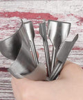Hand holding 7 Piece Leather Half Round Cutter Set For Leathercraft Punching Tools Must Have For Belts Straps Wallets And Bags DIY Handwork Durable Steel Multi Size Blades Easy Hammer Punch For Clean Edges