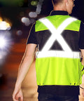 Heavy Duty High Visibility Safety Vest Featuring Breathable Mesh Lining Multiple Storage Pockets And Bright Fluorescent Yellow Fabric For Construction Crew Daily Grind And Rugged Shop Tested Workwear. View from the back showcasing reflective features.