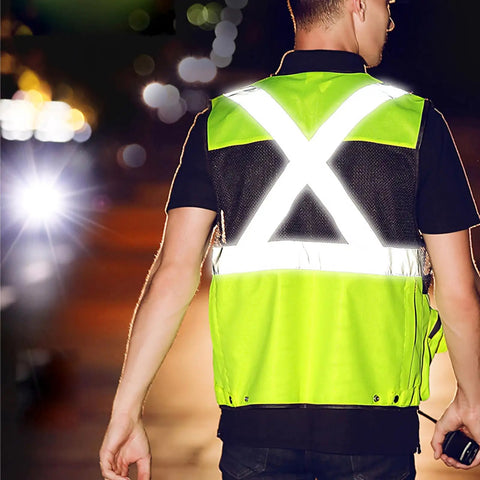 Heavy Duty High Visibility Safety Vest Featuring Breathable Mesh Lining Multiple Storage Pockets And Bright Fluorescent Yellow Fabric For Construction Crew Daily Grind And Rugged Shop Tested Workwear. View from the back showcasing reflective features.