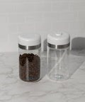 Keep Your Beans Fresh As A Daisy With This Smart Electric Vacuum Seal Coffee Canister And Airtight Storage Jar For Whole Ground Roasts Real Deal Smooth Push Button Operation Durable Borosilicate Glass, two canisters with coffee beans