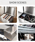 Portable Stainless Steel Tool Box With Heavy Duty Side Handles And Locking Lid And Hella Sturdy Metal Storage Organizer Built Like A Tank For Home Garage Workshop And Yard Projects filled with tools on a table.