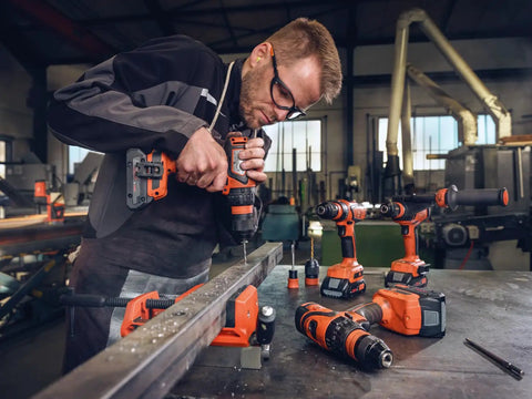 Professional Heavy Duty Compact Four Speed Cordless Drill With Brushless Motor All Metal Transmission QuickIN Adapter And Rugged Case in use on metal.