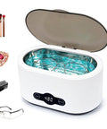 Heavy Duty Portable Ultrasonic Jewelry And Eyeglasses Cleaner Featuring A Slick Stainless Steel Tank with glasses inside.